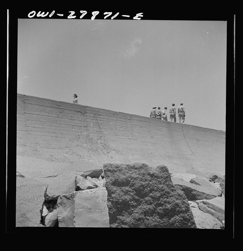 Untitled photo, possibly related to: Galveston, Texas. Three sailors walking along the seawall