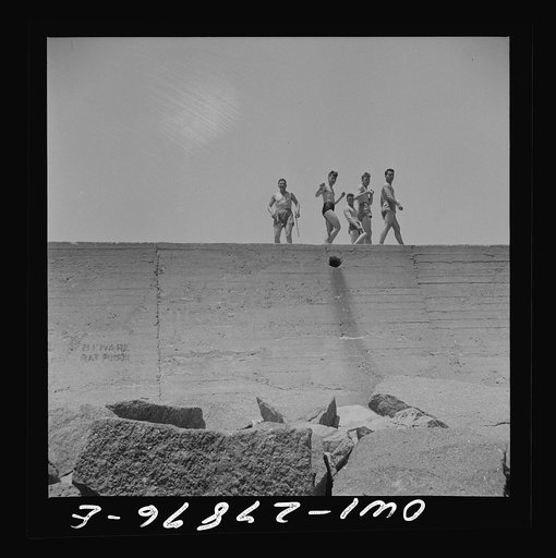 Untitled photo, possibly related to: Galveston, Texas. Soldier, sailor, and two girls on the seawall