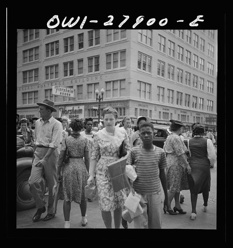 Untitled photo, possibly related to: Houston, Texas. People crossing a downtown street with the green light