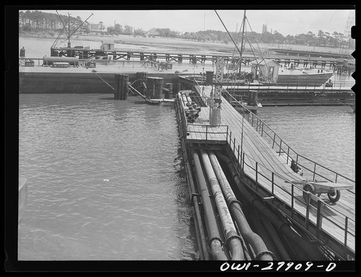 Untitled photo, possibly related to: Baytown, Texas. Pipelines leading to a barge loading dock at a refinery