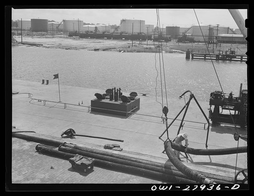 Baytown, Texas. Loading a barge with oil at a refinery