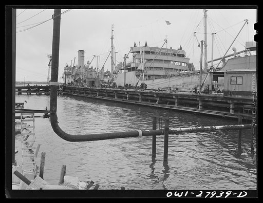 Baytown, Texas. Tanker which is being loaded with oil at a refinery