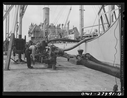 Baytown, Texas. Loading a tanker with oil at a refinery