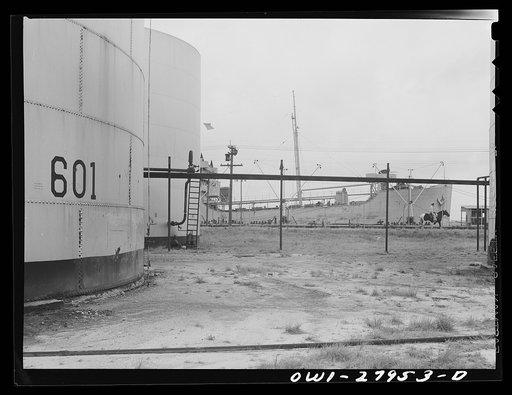 Baytown, Texas. Barges to be loaded with oil at a refinery