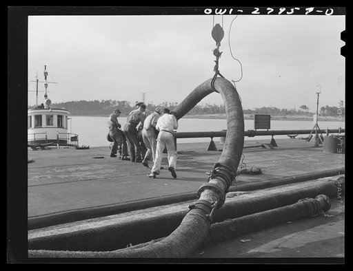 Baytown, Texas. Loading an oil barge