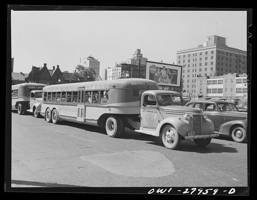 Untitled photo, possibly related to: Houston, Texas. Buses for shipyard workers