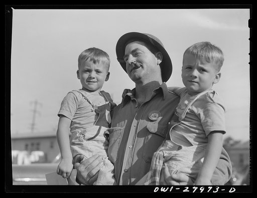 Untitled photo, possibly related to: Ornage, Texas. Shipyard worker with his two sons whom he called for at the nursery