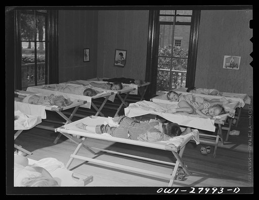 Orange, Texas. Nursery school children taking a mid-afternoon nap