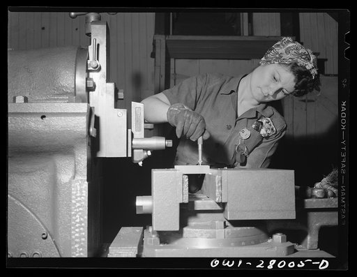 Orange, Texas. Woman learning how to operate a lathe at a training school for war workers
