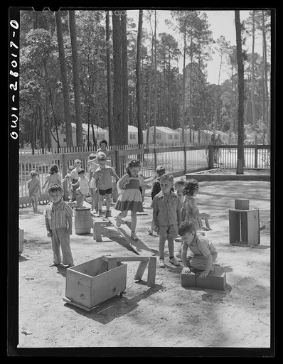 Untitled photo, possibly related to: Orange, Texas. "Sleeping fathers" nursery school. These children are at the nursery school from 8 a. m. until 4 p.m. while their fathers who work on the night shift at the shipyards get their eight hours sleep in quiet homes