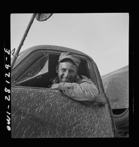 Private Zeno W. Muhl, of Baltimore, Maryland serving with the 429th Engineers as a truck driver. He is a trucker in civilian life, owning his own dump truck