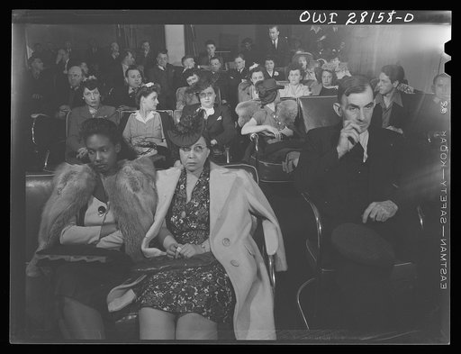 Untitled photo, possibly related to: Buffalo, New Yorl. A Sunday afternoon meeting of the rubber workers union. Despite the fact that the industry has only recently employed women, many of them are attending the meeting