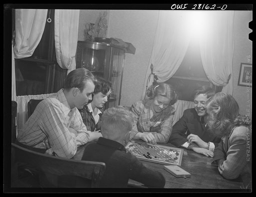 Niagara Falls, New York. Entertaining guest playing Chinese checkers on Nan Hannegan's birthday at Mrs. Hannegan's boardinghouse for war workers