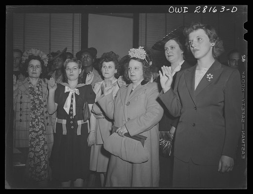 Buffalo, New York. Recently-employed women being sworn into the rubber workers union at a Sunday meeting. Most of them have never worked before and know little about trade unionism