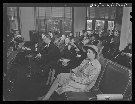 Buffalo, New York. A Sunday afternoon meeting of the rubber workers union. Despite the fact that the industry has only recently employed women, many of them are attending the meeting