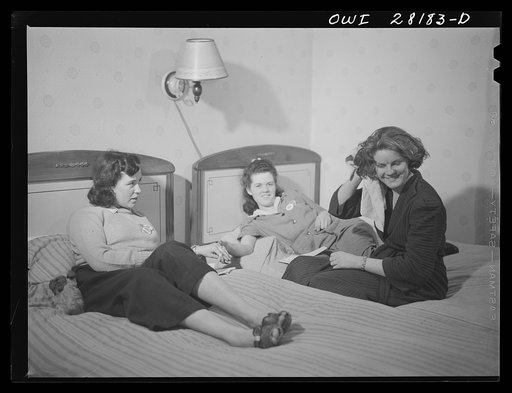 Untitled photo, possibly related to: Niagara Falls, New York. Elaine Colgan and her roommate, Alice, workers at the Bell Aircraft plant, share a room in Mrs. Hannegan's boardinghouse