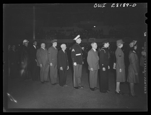 Untitled photo, possibly related to: Buffalo, New York. Silent tribute to the war dead at the "I am an American" day rally in Memorial Auditorium