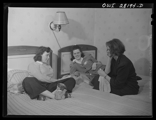 Niagara Falls, New York. Elaine Colgan and her roommate, Alice, workers at the Bell Aircraft plant, share a room in Mrs. Hannegan's boardinghouse