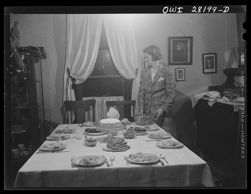 Niagara Falls, New York. The table is set for a midnight supper at Nan Hannegan's twentieth birthday party, at her mother's house where girl war workers board