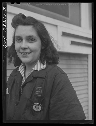 Buffalo, New York. Mrs. Grimm, a twenty-six year old widow with six children who is a crane operator at Pratt and Letchworth (note the PL on her uniform), makers of castings used for ships, tanks, etc.