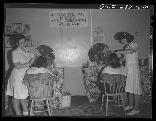 Untitled photo, possibly related to: Buffalo, New York. Mrs. Grimm, a twenty-six year old widow with six children who is a crane operator at Pratt and Letchworth, having her hair done after work