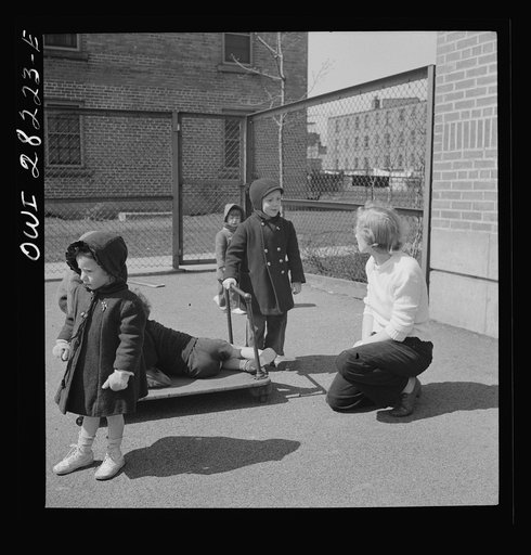 Untitled photo, possibly related to: Buffalo, New York. Lakeview nursery school for children of working mothers, operated by the Board of Education at a tuition fee of three dollars weekly. Mother coming to pick up her child after work