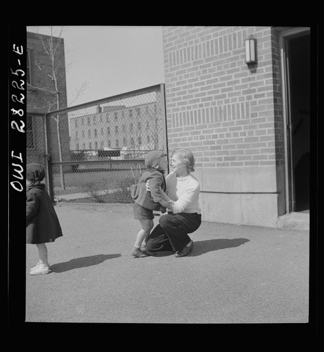 Buffalo, New York. Lakeview nursery school for children of working mothers, operated by the Board of Education at a tuition fee of three dollars weekly. Mother coming to pick up her child after work