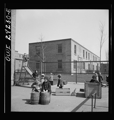 Buffalo, New York. Lakeview nursery school for children of working mothers, operated by the Board of Education at a tuition fee of three dollars weekly. Playing in the well-equipped yard
