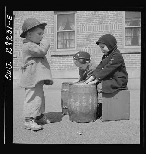 Untitled photo, possibly related to: Buffalo, New York. Lakeview nursery school for children of working mothers, operated by the Board of Education at a tuition fee of three dollars weekly. Playing in the well-equipped yard