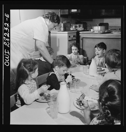 Buffalo, New York. Lakeview nursery school for children of working mothers, operated by the Board of Education at a tuition fee of three dollars weekly. Eating lunch which consists of meat and vegetables, milk, prune whip