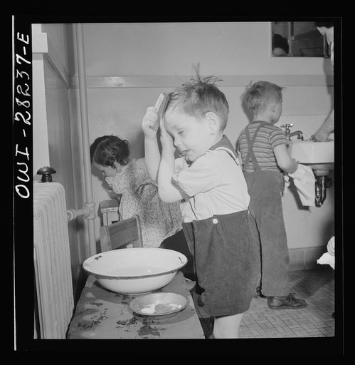 Buffalo, New York. Lakeview nursery school for children of working mothers, operated by the Board of Education at a tuition fee of three dollars weekly. Children themselves washing and combing their hair
