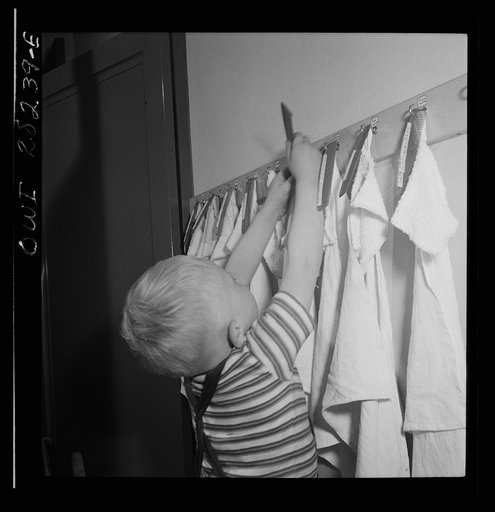 Buffalo, New York. Lakeview nursery school for children of working mothers, operated by the Board of Education at a tuition fee of three dollars weekly. Each child has own comb and towel, washes himself and combs his won hair