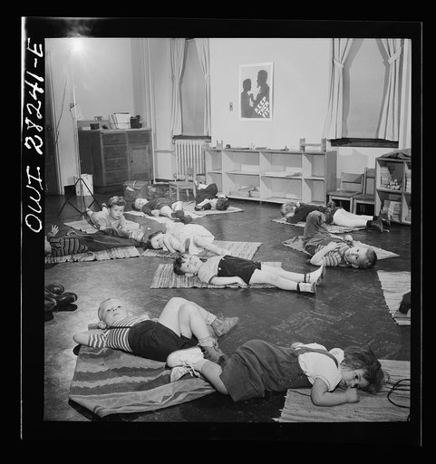 Buffalo, New York. Lakeview nursery school for children of working mothers, operated by the Board of Education at a tuition fee of three dollars weekly. Five-minute rest period on mats before washing up for lunch
