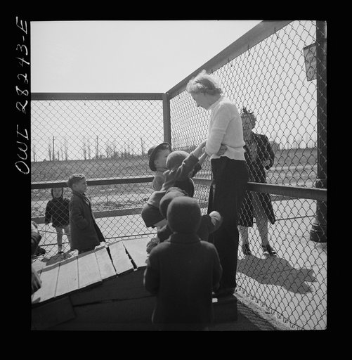 Untitled photo, possibly related to: Buffalo, New York. Lakeview nursery school for children of working mothers, operated by the Board of Education at a tuition fee of three dollars weekly. Mother coming to pick up her child after work