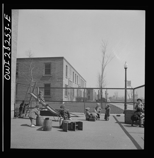 Untitled photo, possibly related to: Buffalo, New York. Lakeview nursery school for children of working mothers, operated by the Board of Education at a tuition fee of three dollars weekly. Playing in the well-equipped yard