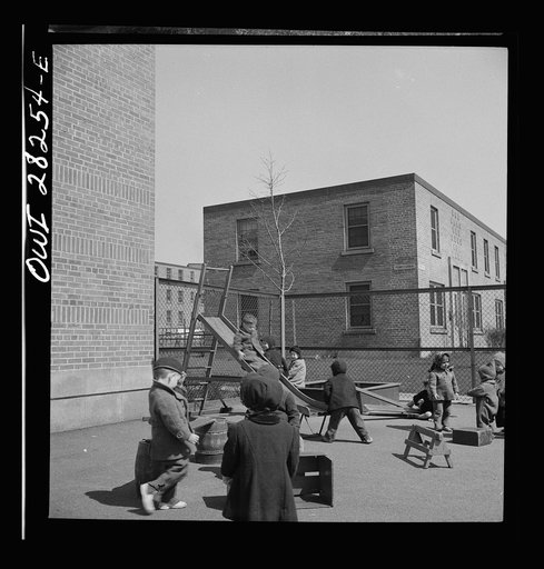 Untitled photo, possibly related to: Buffalo, New York. Lakeview nursery school for children of working mothers, operated by the Board of Education at a tuition fee of three dollars weekly. Playing in the well-equipped yard