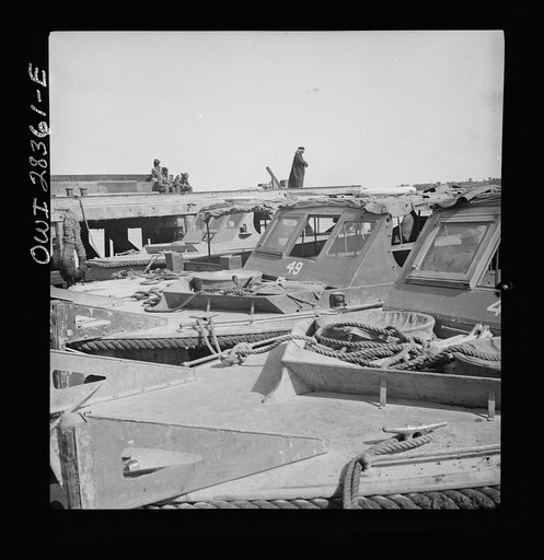 Higgins speedboats made in New Orleans in a port in the Middle East