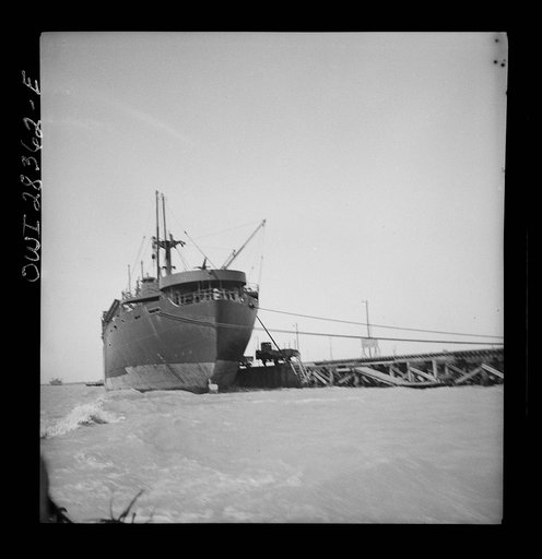 A Liberty ship carrying supplies destined for Russia docked at a port in the Middle East