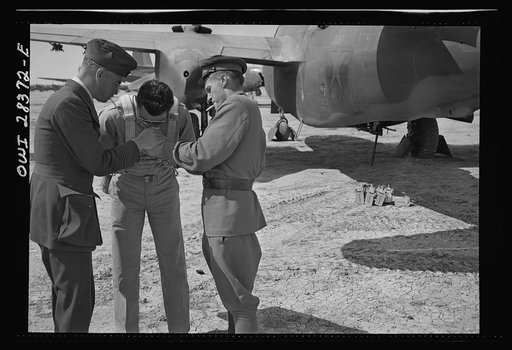 American, Russian and Royal air force pilots at a delivery point of Allied warplanes to the Russians somewhere in Iran