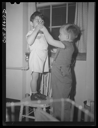 Untitled photo, possibly related to: Buffalo, New York. Lakeview nursery school for children of working mothers, operated by the Board of Education at a tuition fee of three dollars weekly. After the health examination, children drink a glass of water