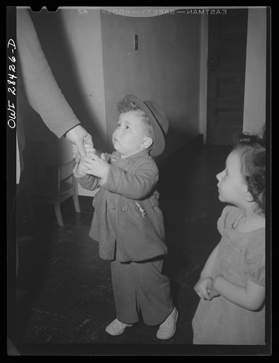 Buffalo, New York. Lakeview nursery school for children of working mothers, operated by the Board of Education at a tuition fee of three dollars weekly. Gary saying goodbye to his father who has brought him to school