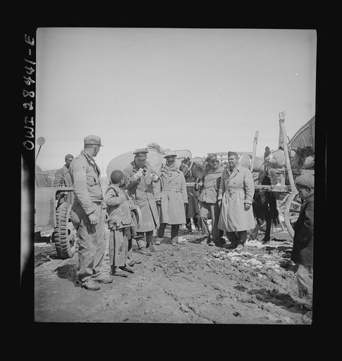 Correspondents with a United States Army truck convoy which carried supplies for the aid of Russia somewhere in Iran