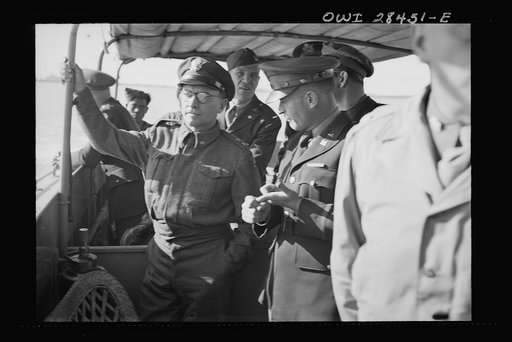 Major General Lewis Brererton inspecting port facilities somewhere in the Middle East. Handling ships bringing supplies for the aid of Russia