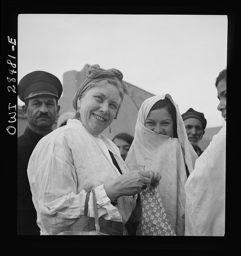 Teheran, Iran. Mrs. Louis Dreyfus, wife of the United States Minister to Iran, visiting native inhabitants