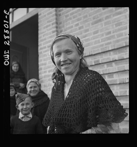 Teheran, Iran. Smiling Polish peasant awaiting evacuation at a camp operated by the Red Cross