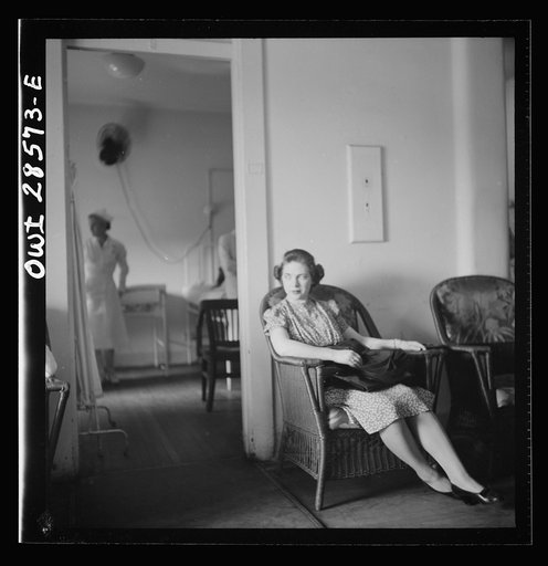 Untitled photo, possibly related to: Washington, D.C. A blood donor enjoying a glass of water before leaving the American Red Cross center