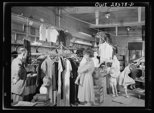 Bargains are the keynote at the Hardwick victory store and here are seen some of the women folk who know a bargain when they see one. Because it helps the war effort, it makes the buying just that more keen
