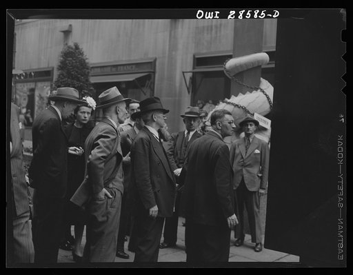 New York, New York. Spectators at the Nature of the Enemy show, put up by the United States OWI (Office of War Information) at Rockefeller Plaza