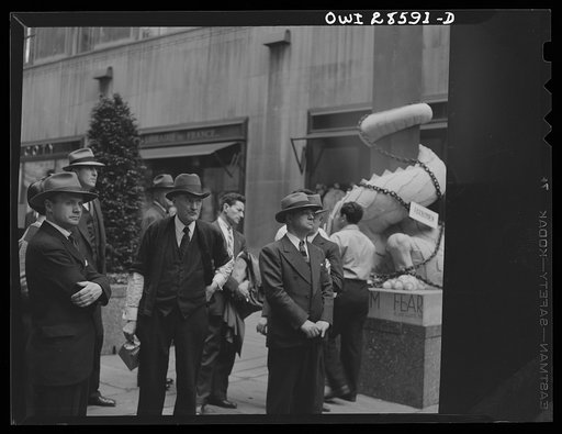 New York, New York. Spectators at the Nature of the Enemy show, put up by the United States OWI (Office of War Information) at Rockefeller Plaza