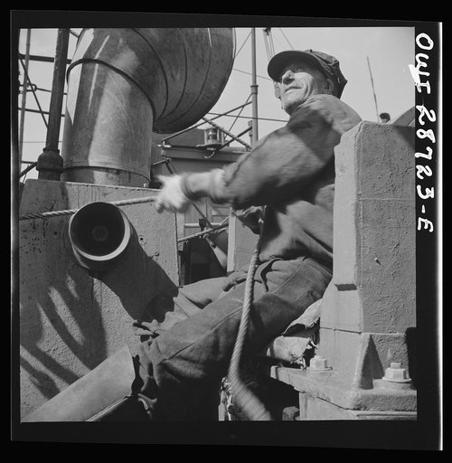 Untitled photo, possibly related to: New York, New York. A hoister unloading fish at Fulton fish market
